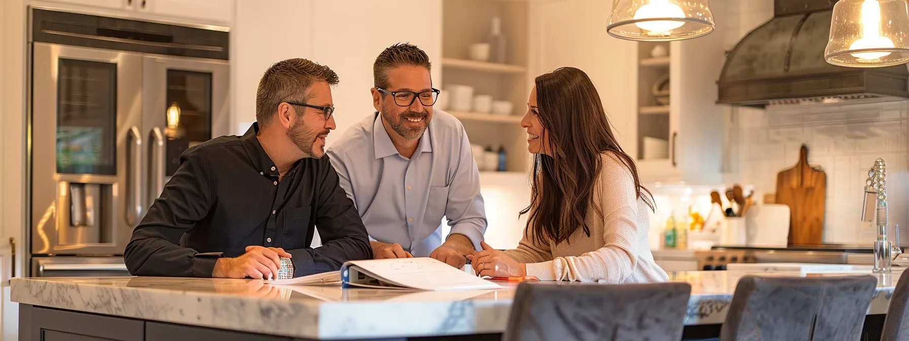 homeowners discussing budget options while reviewing kitchen design plans.