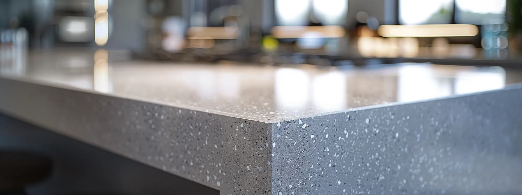 a sleek, modern quartz benchtop being expertly installed in a bright, contemporary kitchen setting.